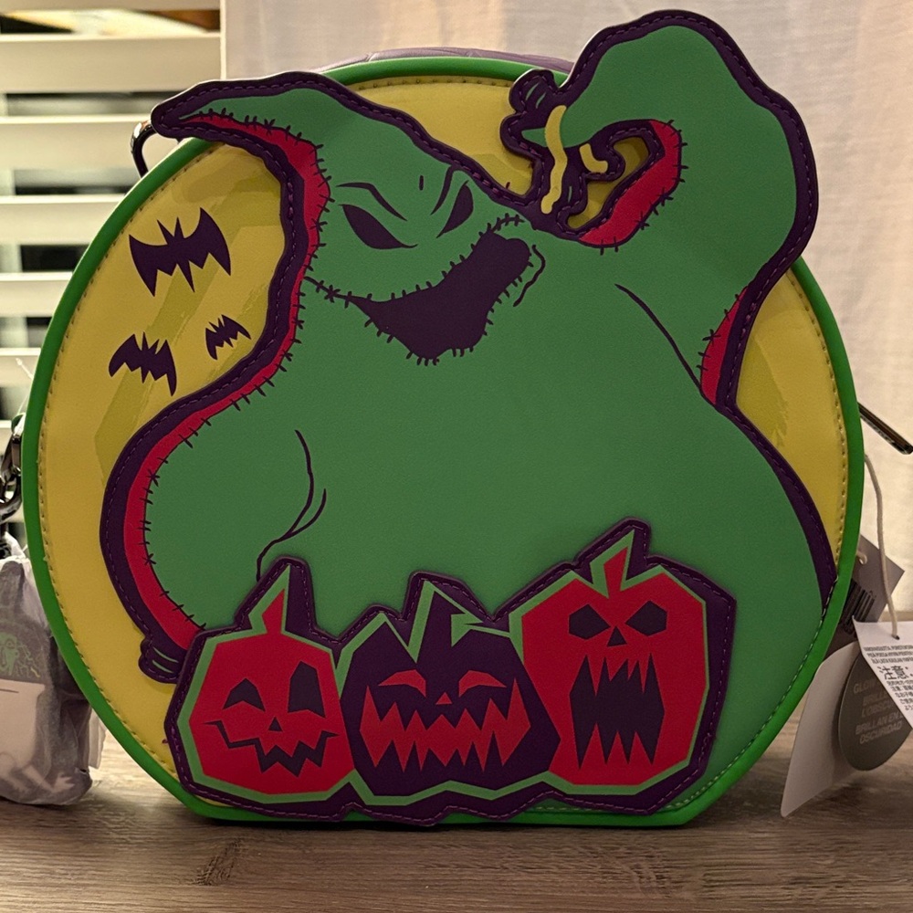 Loungefly Green and Yellow Kids Bag with Red Accents